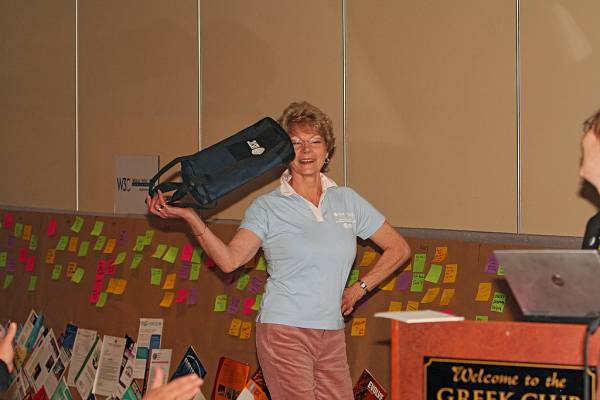 Orme Appleford, modelling DSTC rugby shirt with matching cooler bag,  | DSTC Farewell Symposium, 28 July 2005  | 