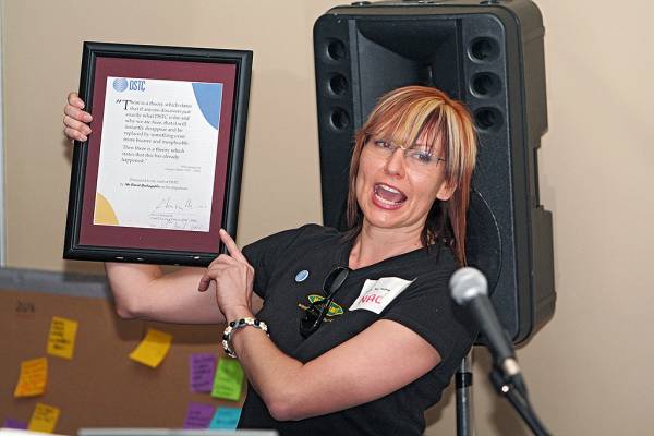 Naomi Andrew, raffling the David Barbagallo farewell address,  | DSTC Farewell Symposium, 28 July 2005  | 