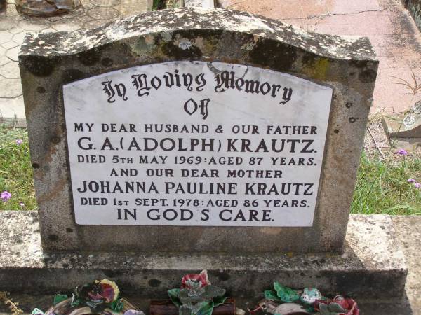 G.A. (Adolph) KRAUTZ, husband father,  | died 5 May 1969 aged 87 years;  | Johanna Pauline KRAUTZ, mother,  | died 1 Sept 1978 aged 86 years;  | Douglas Lutheran cemetery, Crows Nest Shire  | 