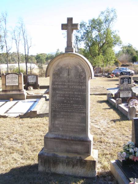 William REYNOLDS,  | husband of Catherine REYNOLDS,  | native of Co Roscommon Ireland,  | died 21 May 1912;  | Mary REYNOLDS,  | died 26 Oct 1916 aged 11 years;  | Catherine REYNOLDS,  | died 28 Sept 1927 aged 80? years;  | Helidon Catholic cemetery, Gatton Shire  | 