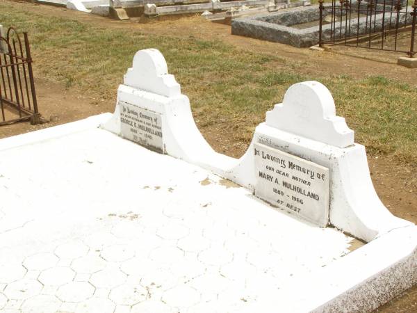 George E. MULHOLLAND,  | husband father,  | 1880 - 1940;  | Mary A.MULHOLLAND,  | mother,  | 1880 - 1966;  | Jandowae Cemetery, Wambo Shire  | 