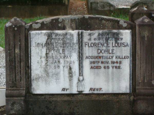 Johann Rudolf DOHLE,  | father,  | died 23 Jan 1965 aged 88 years  | Florence Louise DOHLE,  | wife mother,  | accidentally killed 26 Nov 1942 aged 65 years;  | Lawnton cemetery, Pine Rivers Shire  | 