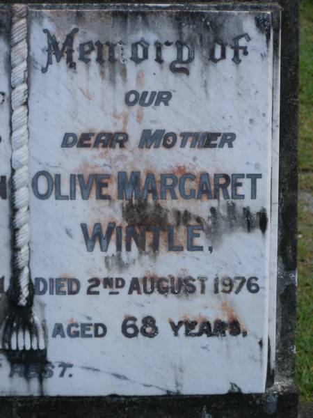 John Norton WINTLE,  | husband father,  | died 14 Aug 1951 aged 52 years;  | Olive Margaret WINTLE,  | mother,  | died 2 Aug 1976 aged 68 years;  | Mudgeeraba cemetery, City of Gold Coast  | 