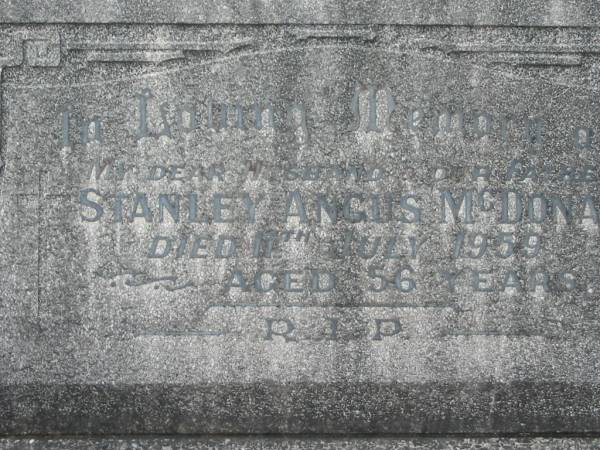 Stanley Angus MCDONALD,  | husband father,  | died 11 July 1959 aged 56 years;  | Florence May MCDONALD,  | mother,  | died 24 June 1988 aged 77 years;  | Stanley Michael MCDONALD,  | husband father brother,  | born 21-11-41,  | died 24-01-05;  | Murwillumbah Catholic Cemetery, New South Wales  | 