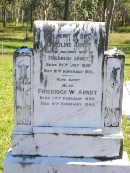 Caroline ARNDT,  | wife of Friedrich ARNDT,  | born 27 July 1858,  | died 12 Nov 1931;  | Friedrich W. ARNDT,  | born 20 Feb 1858,  | died 4 Feb 1945;  | Pimpama Island cemetery, Gold Coast  | 