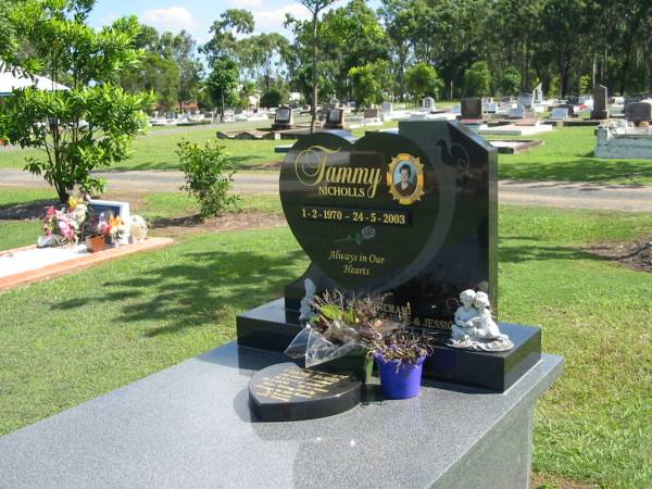 Tammy NICHOLLS,  | 1-2-1970 - 24-5-2003,  | wife of Craig,  | mother of Jade & Jessica;  | Frank JAMES,  | dad grandad great-grandad,  | 21-3-1930 - 10-4-2004,  | with Tammy;  | Polson Cemetery, Hervey Bay  | 