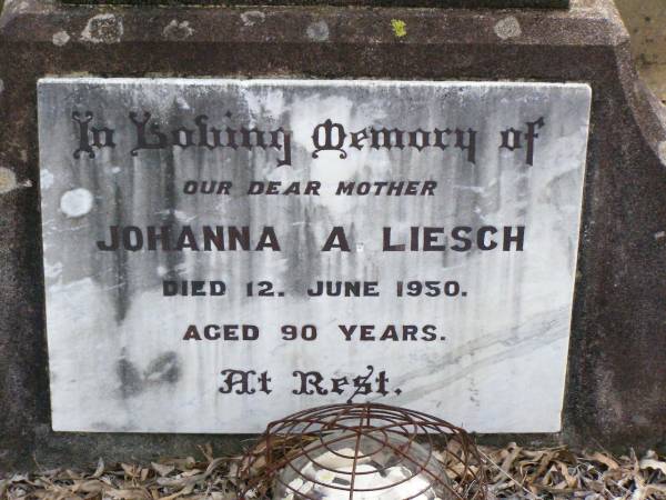 Ferdinand L. LIESCH, husband father,  | died 19 Jan 1942 aged 83 years 10 months;  | Johanna A. LIESCH, mother,  | died 12 June 1950 aged 90 years;  | Ropeley Immanuel Lutheran cemetery, Gatton Shire  |