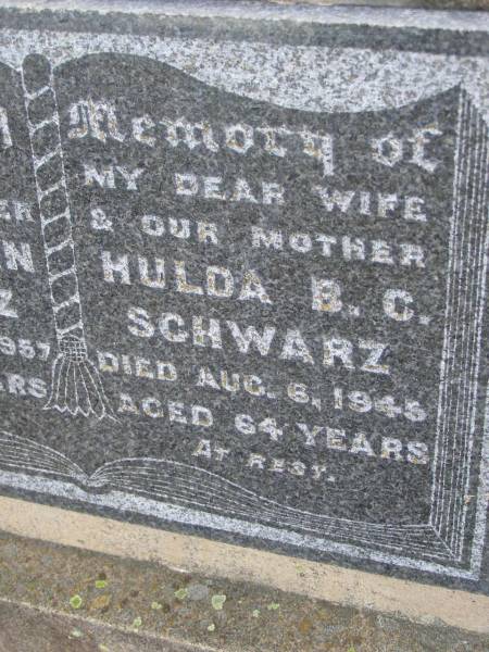 T. Hermann SCHWARZ,  | father grandfather,  | died 10 Sept 1957 aged 82 years;  | Hulda B.C. SCHWARZ,  | wife mother,  | died 6 Aug 1945 aged 64 years;  | Silverleigh Lutheran cemetery, Rosalie Shire  | 